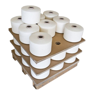 Die-cut honeycomb boards holding paper rolls.